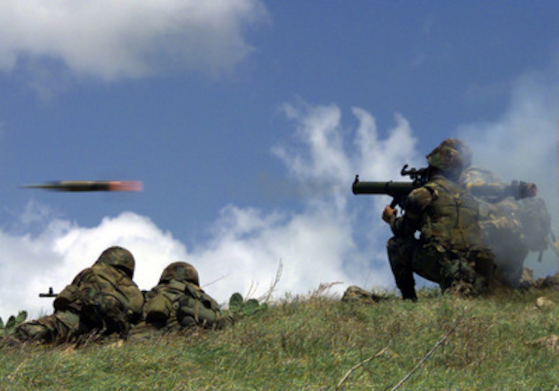 A Marine fires a Shoulder Launched Multipurpose Assault Weapon at a target on the range at Townshend Island, Australia, on March 12, 1998, during Exercise Valiant Usher 98-1. Valiant Usher is a combined, U.S.-Australian live fire exercise at the Shoalwater Bay Training Area. These Marines are attached to Bravo Company, 1st Battalion, 3 Marine Regiment, 31st Marine Expeditionary Unit (Special Operations Capable). The assault weapon is a portable anti-armor rocket launcher. 