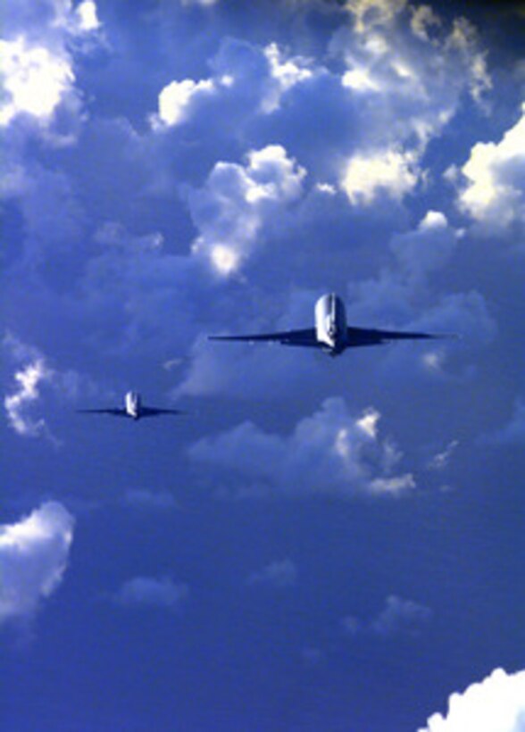 Two KC-10 Extender aerial tankers fly over the Indian Ocean on Feb. 23, 1998, awaiting the arrival of B-52H Stratofortress long-range heavy bombers for in-flight refueling. Both aircraft are part of the 2nd Air Expeditionary Group, 8th Air Force, which is forward deployed to the British Indian Ocean Territory of Diego Garcia. The Extenders are deployed from the 2nd Air Refueling Squadron, McGuire Air Force Base, N.J. 