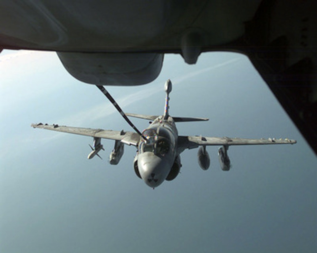 A U.S. Navy EA-6B Prowler is refueled in flight by a U.S. Air Force KC-10 Extender over the Persian Gulf on March 3, 1998. The Prowler is from Tactical Electronics Warfare Squadron 136 and is operating from the aircraft carrier USS Independence (CV 62). Independence and its embarked Carrier Air Wing 5 are on station in the Persian Gulf in support of Operation Southern Watch which is the U.S. and coalition enforcement of the no-fly-zone over Southern Iraq. The Extender is attached to the 305th Air Expeditionary Group. 