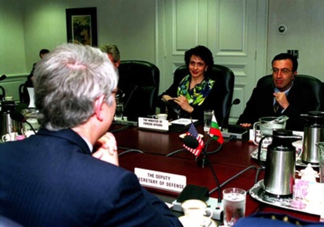 Deputy Secretary of Defense John Hamre (left, back to camera) meets with Bulgarian Foreign Minister Nadezhda Mihailova (center) and President Peter Stoyanov (right) at the Pentagon on Feb. 12, 1998, to discuss a range of security issues of interest to both nations. 