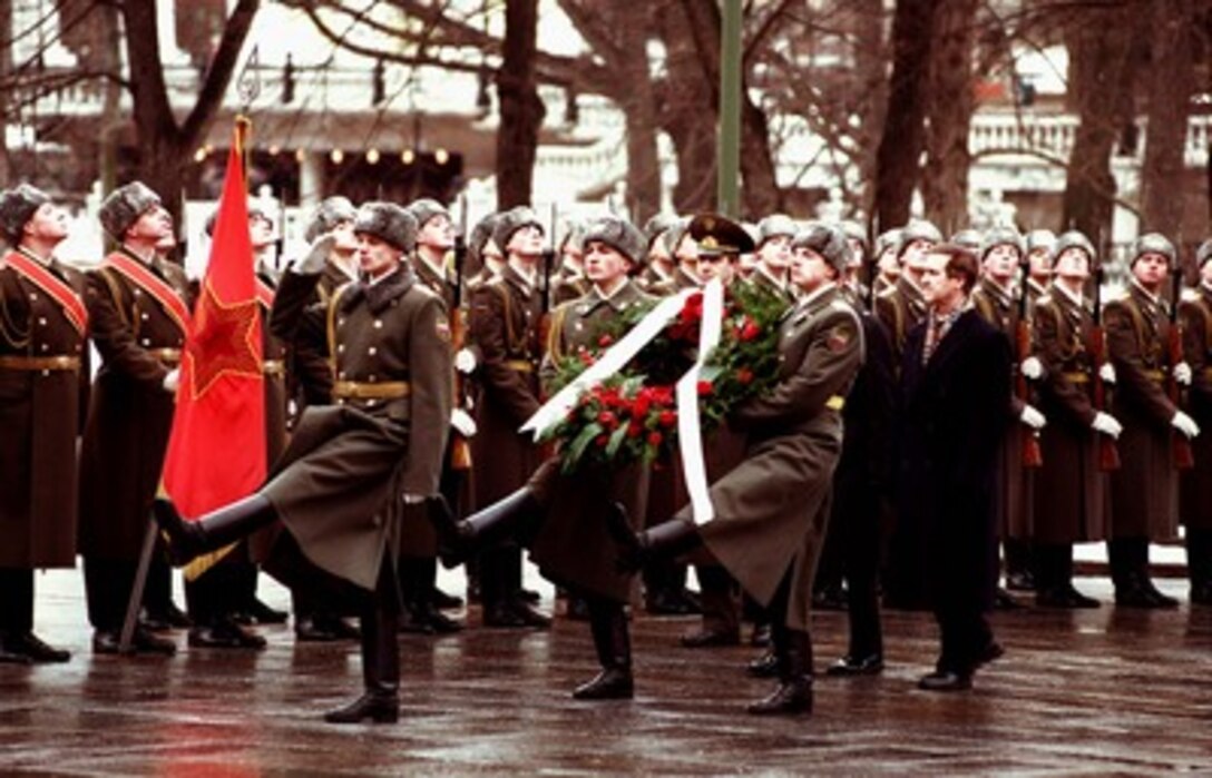 Secretary of Defense William S. Cohen participates in a wreath laying ceremony at Alexandrovsky Sud, Moscow, Russia on Feb. 12, 1998. Cohen is in Moscow to meet with his Russian counterparts. 