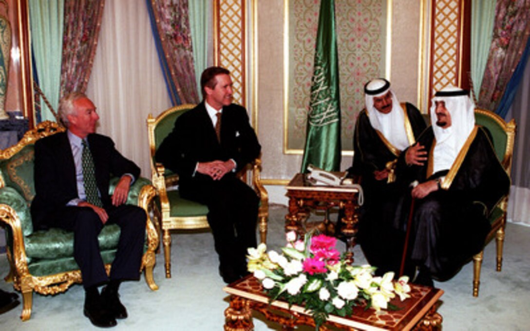 King Fahd bin Abd al-Aziz Al Saud (right) receives a visit by Secretary of Defense William S. Cohen (center) at his palace in Jeddah, Kingdom of Saudi Arabia on Feb. 8, 1998. Accompanying Cohen is U.S. Ambassador to the Kingdom of Saudi Arabia Wyche Fowler (center). 
