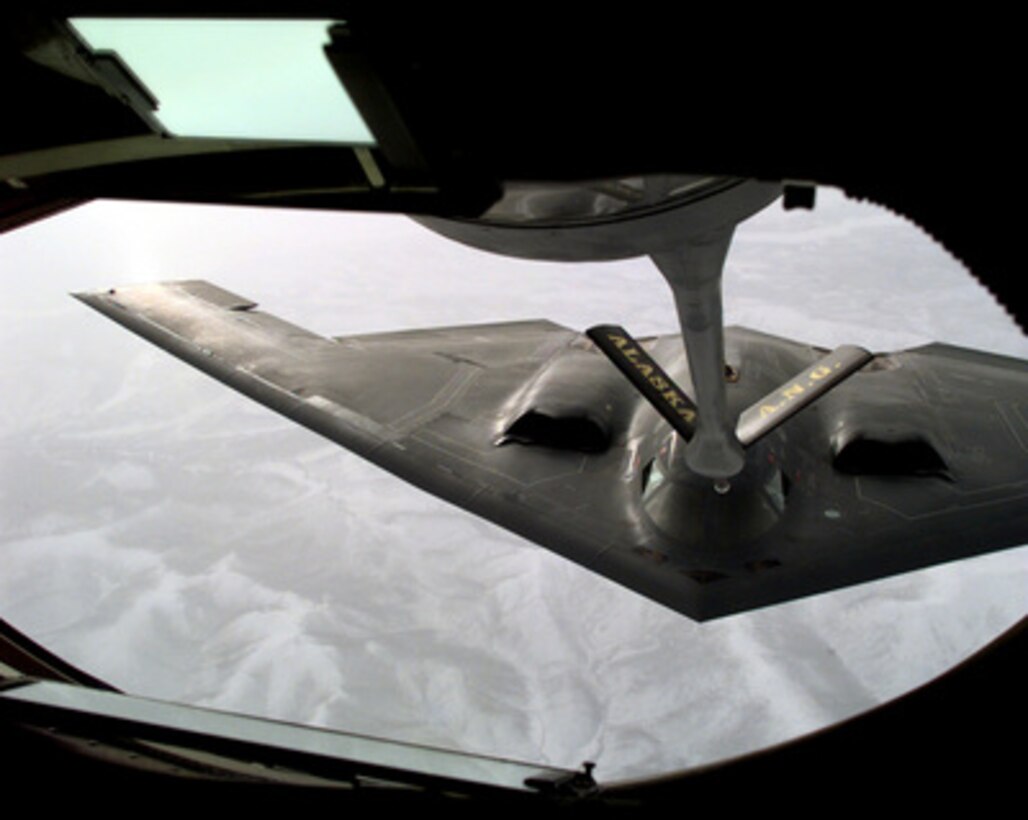 A U.S. Air Force B-2A Spirit bomber approaches the refueling boom of a KC-135R Stratotanker as the two aircraft rendezvous over Alaska for an in-flight refueling on March 17, 1998. The stealth bomber is participating in testing of modified bombs at the Stuart Creek Impact Area, near Fairbanks, Alaska. The Spirit is deployed from the 509th Bomb Wing, Whiteman Air Force Base, Mont. The Stratotanker is attached to the 168th Air Refueling Wing, Alaska Air National Guard, Eielson Air Force Base, Alaska. 