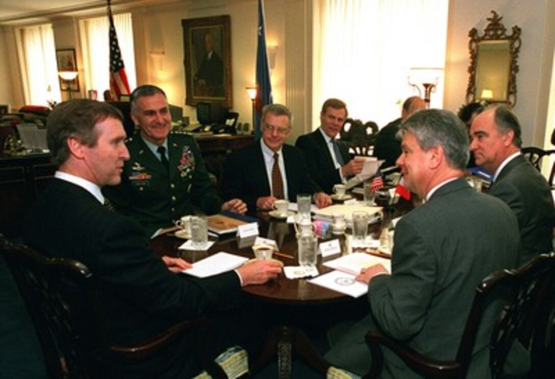 Secretary of Defense William S. Cohen (left) meets in his Pentagon office with visiting Minister of Defense Alain Richard of France (Cohen's right) on April 30, 1998. Among the other officials attending the meeting are Gen. Henry H. Shelton, U.S. Army, chairman of the Joint Chiefs of Staff (second from left), and French Ambassador Francois Bujon de l'Estang (right of Richard). 