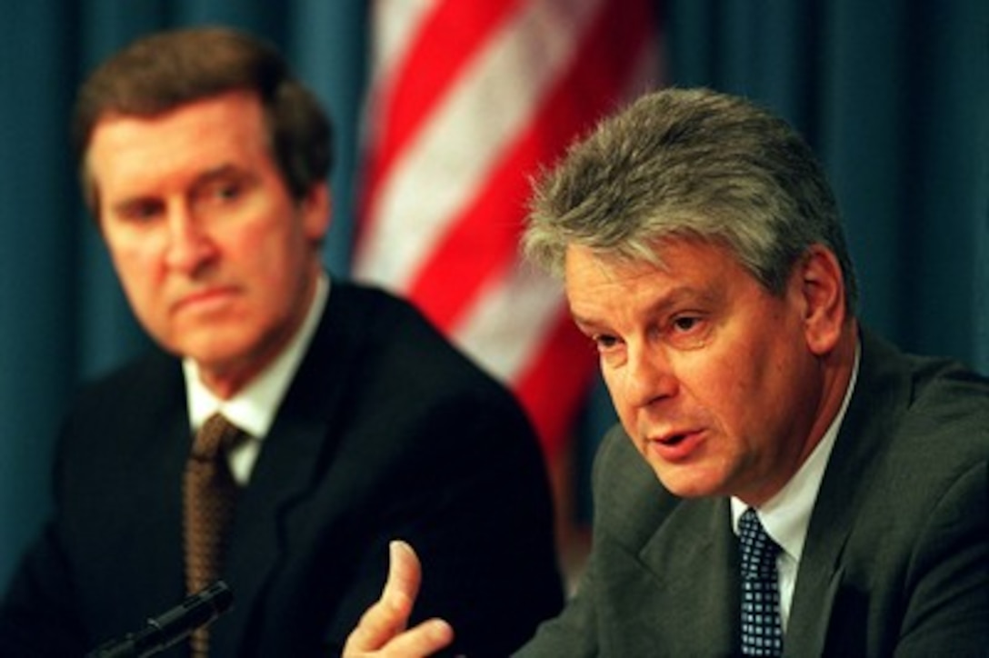 French Minister of Defense Alain Richard (right) responds to a reporter's question during a joint media availability with Secretary of Defense William S. Cohen (left) at the Pentagon on April 30, 1998. The press conference came at the conclusion of Richard's two day visit to Washington for discussions with senior U.S. defense officials. 