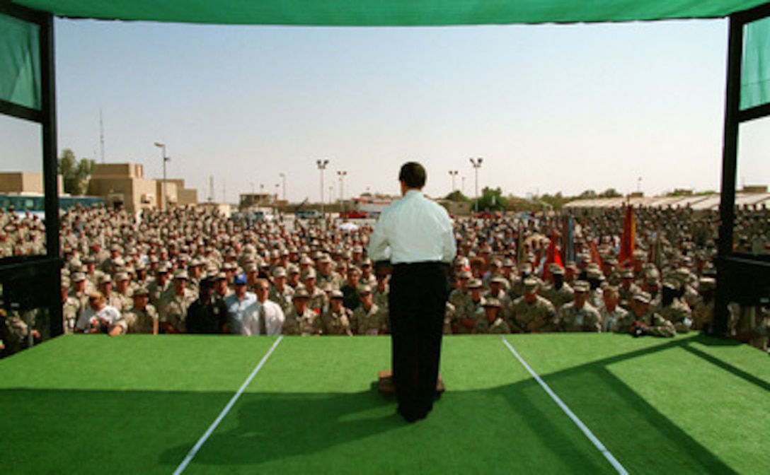 Hundreds of U.S. personnel gather at Eskan Village, Saudi Arabia, to hear Secretary of Defense William S. Cohen's address and take the opportunity to ask questions during his visit on Oct. 13, 1998. Cohen is in the Persian Gulf region to visit with U.S. troops and heads of state in the Gulf countries. 
