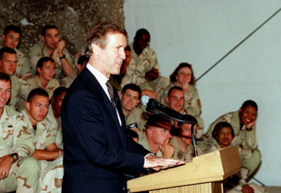 Secretary of Defense William S. Cohen addresses U.S. forces at Prince Sultan Air Base, Saudi Arabia, on Oct. 14, 1998. Cohen is in the Persian Gulf region to visit with U.S. troops and heads of state in the Gulf countries. 