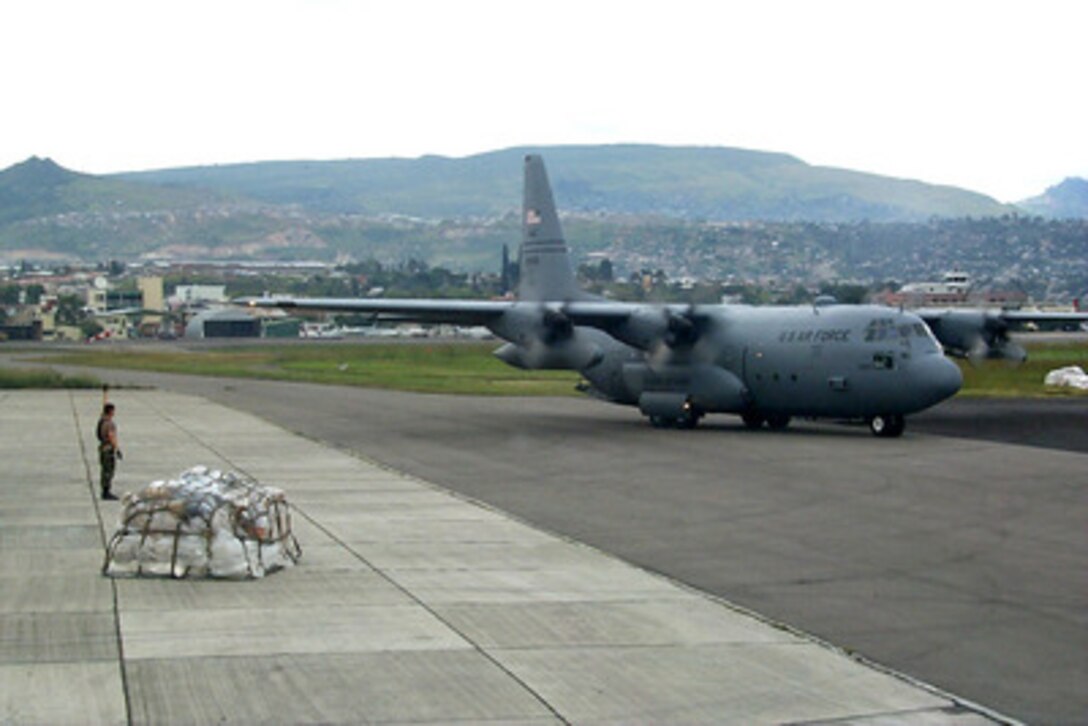 An Alaska Air National Guard C-130 Hercules taxis to the ramp at the airport in Tegucigalpa, Honduras, on Nov. 11, 1998. Over 1,000 U.S. service members are helping to rush food, shelter, pure water and medical aid to the central Americans made homeless by Hurricane Mitch. The Hercules is attached to the 176th Air Wing. 