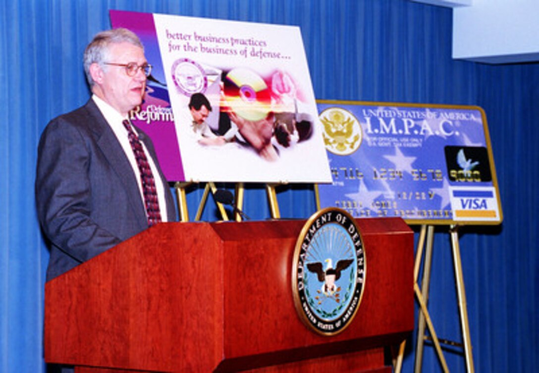 Deputy Secretary of Defense John J. Hamre briefs reporters on the accomplishments of the Defense Reform Initiatives in the Pentagon on Oct. 8, 1998. 