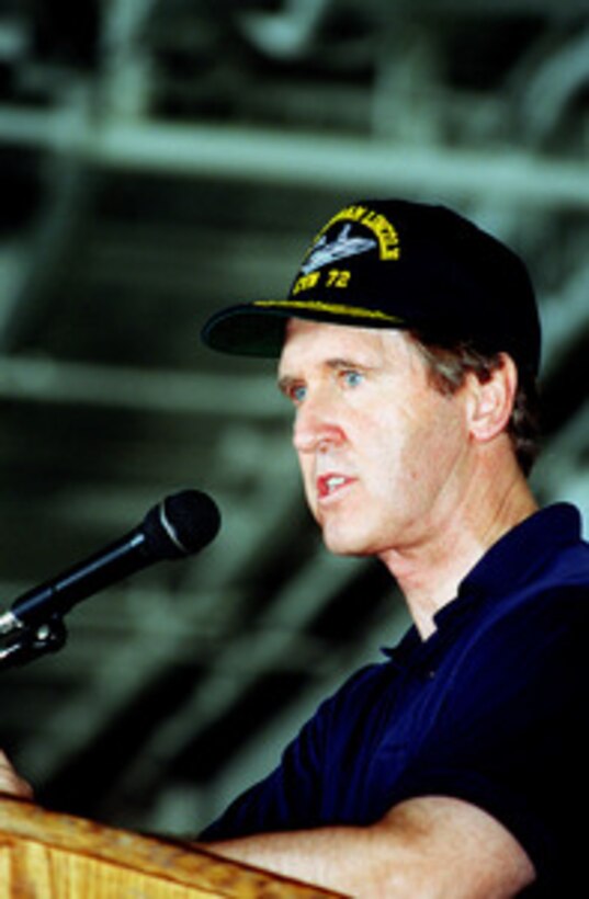Secretary of Defense William S. Cohen addresses sailors and Marines in the hangar deck of the USS Abraham Lincoln (CVN 72) on Oct. 10, 1998, as the aircraft carrier operates in the Persian Gulf. Cohen is in the Persian Gulf region to visit with U.S. troops and heads of state in the Gulf countries. 