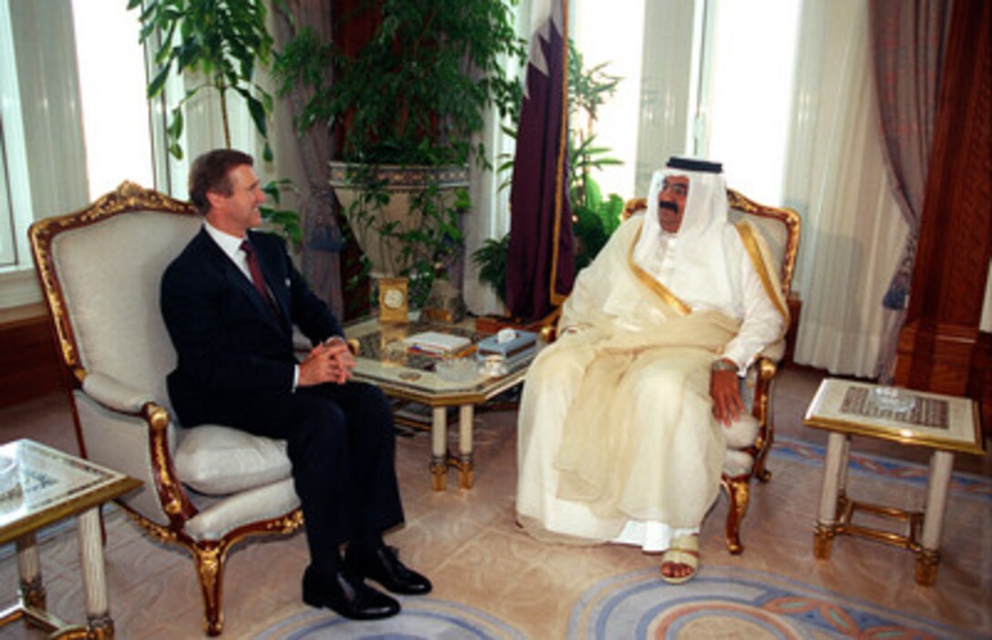 Secretary of Defense William S. Cohen (left) meets with His Highness the Emir, Hamad bin Khalifa Al-Thani (right), at the Emiri Diwan, Doha, Qatar, on Oct. 11, 1998. Cohen is in the Persian Gulf region to visit with U.S. troops and heads of state in the Gulf countries. 