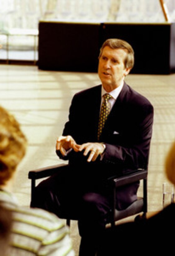 Secretary of Defense William S. Cohen responds to a question by one of the participants in the Young Political Leaders Program on July 30, 1998, in Sydney, Australia. Secretary of State Madeleine Albright joined Cohen for the program held in the Sydney Opera House. The two U.S. leaders are in Sydney for the annual Australia-United States Ministerial Consultations to discuss regional and global issues and to further the alliance between the U.S. and Australia. 