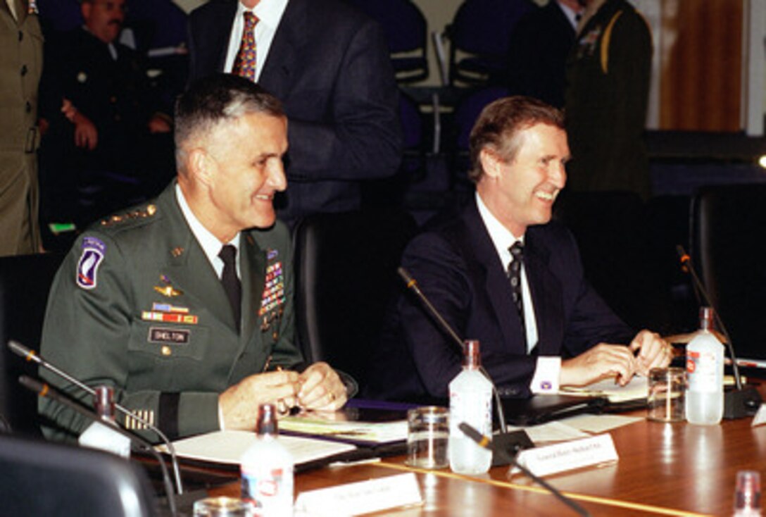 Gen. Henry H. Shelton (left), U.S. Army, chairman, Joint Chiefs of Staff and Secretary of Defense William S. Cohen (right) attend the annual Australia-United States Ministerial Consultations held at HMAS Watson, in Sydney, Australia, on July 31, 1998. The two U.S. leaders are in Sydney for the annual Australia-United States Ministerial Consultations to discuss regional and global issues and to further the alliance between the U.S. and Australia. 