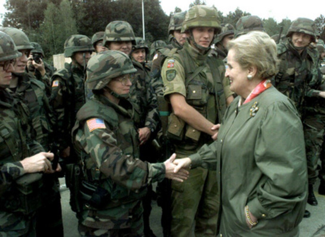 U.S. Secretary of State Madeleine Albright greets the troops at Tuzla Air Base, Bosnia and Herzegovina, during her visit on Aug. 30, 1998. The troops are deployed to Tuzla in support of Operation Joint Forge. 