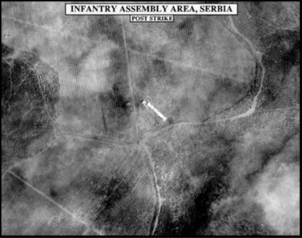 Post-strike bomb damage assessment photograph of an Infantry Assembly Area in Serbia used by Joint Staff Director of Intelligence Rear Adm. Thomas R. Wilson, U.S. Navy, during a press briefing on NATO Operation Allied Force in the Pentagon on April 6, 1999. 