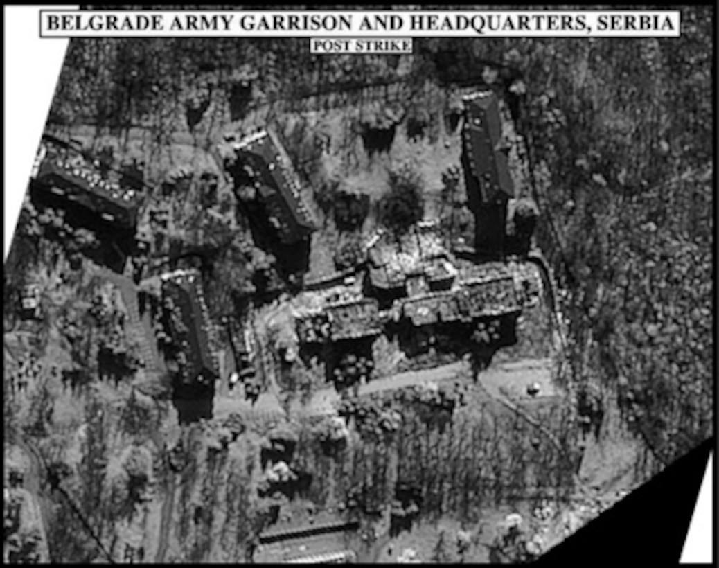 Post-strike bomb damage assessment photograph of the Belgrade Army Garrison and Headquarters, Serbia, used by Joint Staff Director of Intelligence Rear Adm. Thomas R. Wilson, U.S. Navy, during a press briefing on NATO Operation Allied Force in the Pentagon on April 6, 1999. 