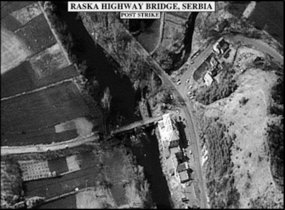Post-strike bomb damage assessment photograph of the Raska Highway Bridge, Serbia, used by Joint Staff Director of Intelligence Rear Adm. Thomas R. Wilson, U.S. Navy, during a press briefing on NATO Operation Allied Force in the Pentagon on April 7, 1999. 