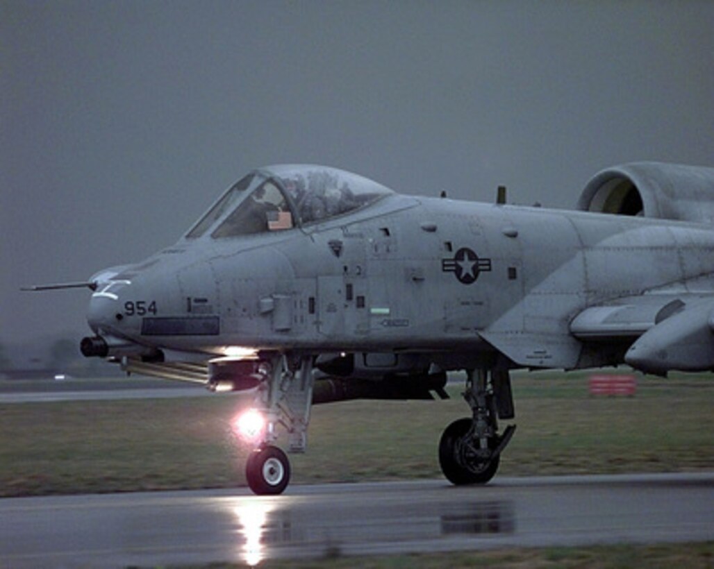 An Air Force A-10 Thunderbolt II taxis through the rain at Aviano Air Base, Italy, before taking off on a mission against targets in the Federal Republic of Yugoslavia on April 7, 1999, during NATO Operation Allied Force. The Thunderbolt, more commonly called a Warthog, and its crew are deployed to Aviano from the 81st Fighter Squadron, Spangdahlem Air Base, Germany, in support of Allied Force. 