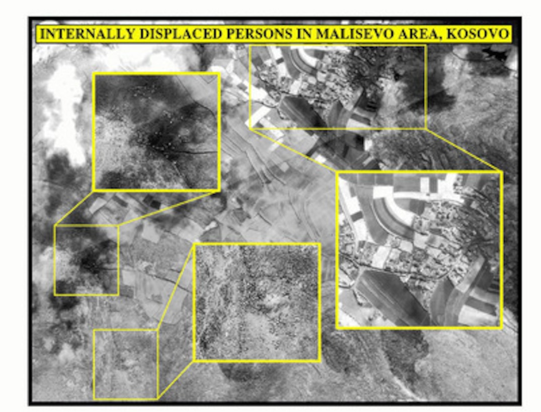Photograph of internally displaced persons in Malisevo area, Kosovo, used by Joint Staff Vice Director for Strategic Plans and Policy Maj. Gen. Charles F. Wald, U.S. Air Force, during a press briefing on NATO Operation Allied Force in the Pentagon on April 10, 1999. 