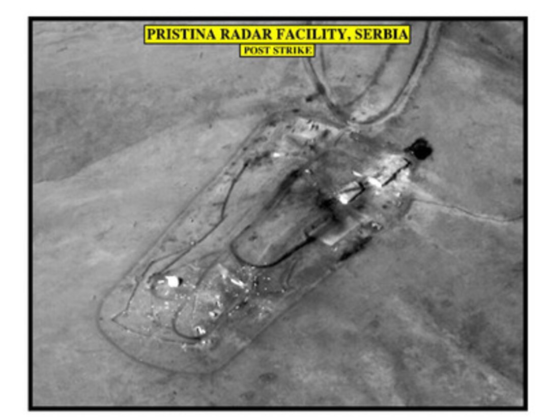 Post-strike assessment photograph of the Pristina Radar Facility, used by Joint Staff Vice Director for Strategic Plans and Policy Maj. Gen. Charles F. Wald, U.S. Air Force, during a press briefing on NATO Operation Allied Force in the Pentagon on April 12, 1999. 