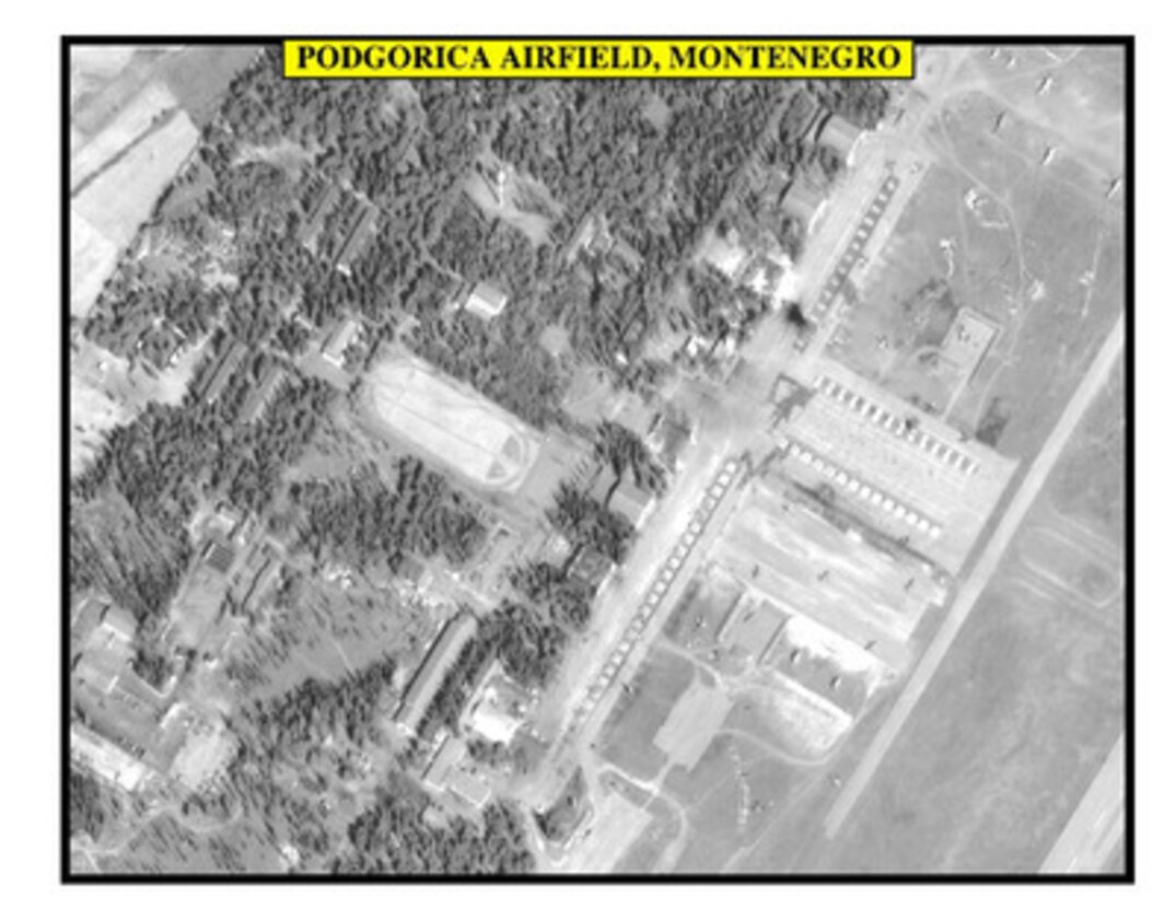 Post-strike assessment photograph of Podgorica Airfield, Montenegro, used by Joint Staff Vice Director for Strategic Plans and Policy Maj. Gen. Charles F. Wald, U.S. Air Force, during a press briefing on NATO Operation Allied Force in the Pentagon on April 13, 1999. 