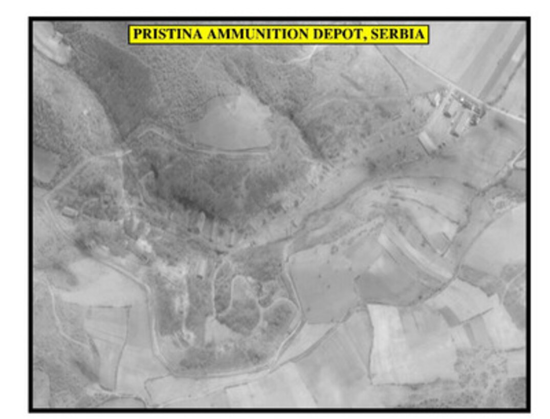 Post-strike assessment photograph of the Pristina Ammunition Depot, Serbia, used by Joint Staff Vice Director for Strategic Plans and Policy Maj. Gen. Charles F. Wald, U.S. Air Force, during a press briefing on NATO Operation Allied Force in the Pentagon on April 13, 1999. 