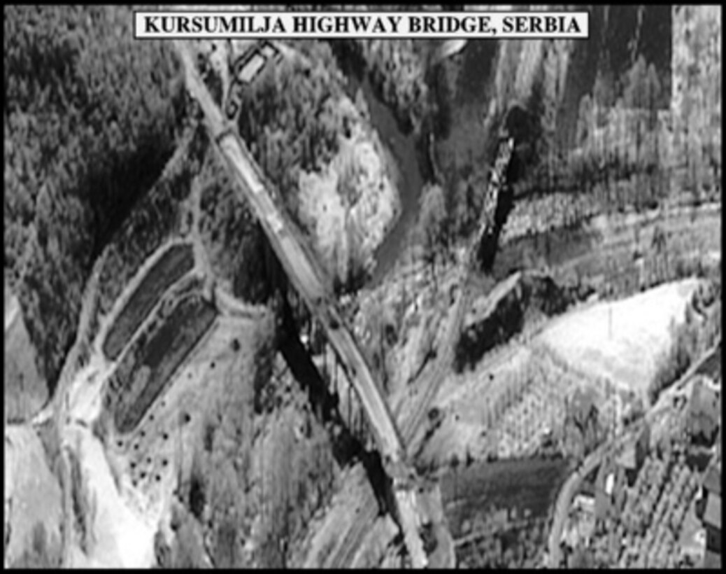 Post-strike bomb damage assessment photograph of the Kursumilja Highway Bridge, Serbia, used by Joint Staff Vice Director for Strategic Plans and Policy Maj. Gen. Charles F. Wald, U.S. Air Force, during a press briefing on NATO Operation Allied Force in the Pentagon on April 19, 1999. 