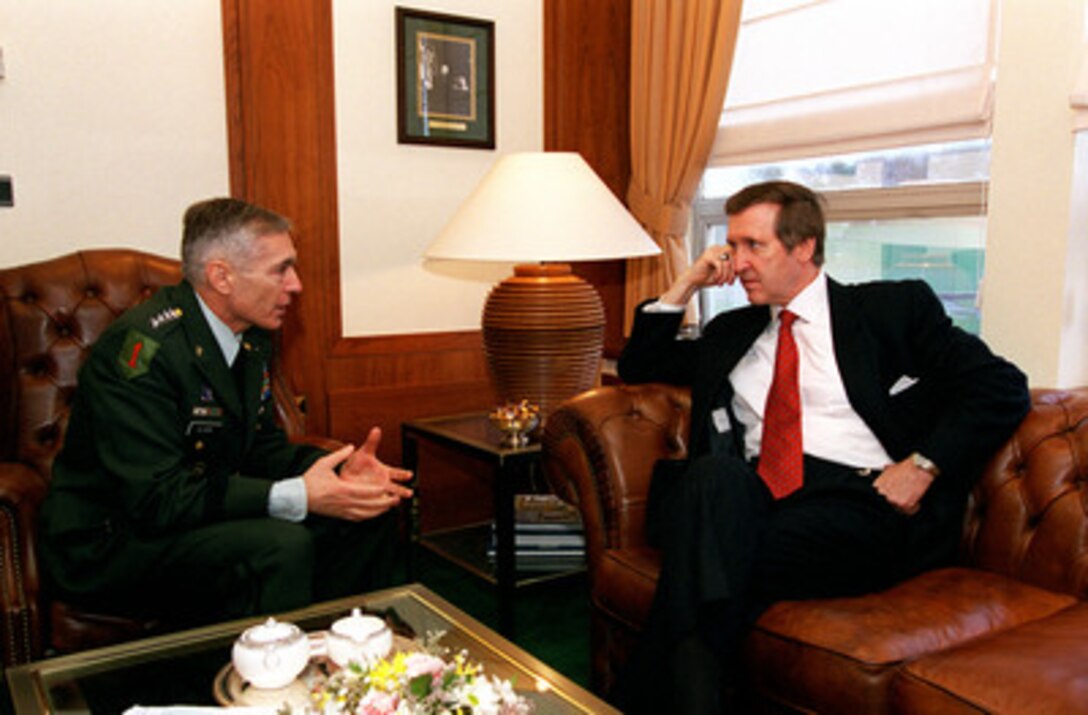 Gen. Wesley K. Clark, U.S. Army, Supreme Allied Commander Europe, meets with Secretary of Defense William S. Cohen to discuss NATO Operation Allied Force at Supreme Headquarters Allied Powers Europe, Mons, Belgium, on April 7, 1999. 