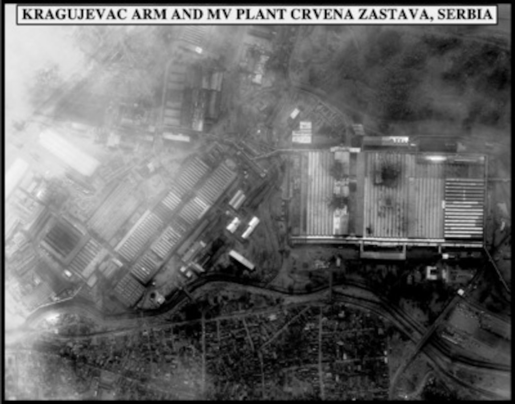 Post-strike bomb damage assessment photograph of the Kragujevac Armor and Motor Vehicle Plant Crvena Zastava, Serbia, used by Joint Staff Director of Intelligence Rear Adm. Thomas R. Wilson, U.S. Navy, during a press briefing on NATO Operation Allied Force in the Pentagon on April 22, 1999. (Released)