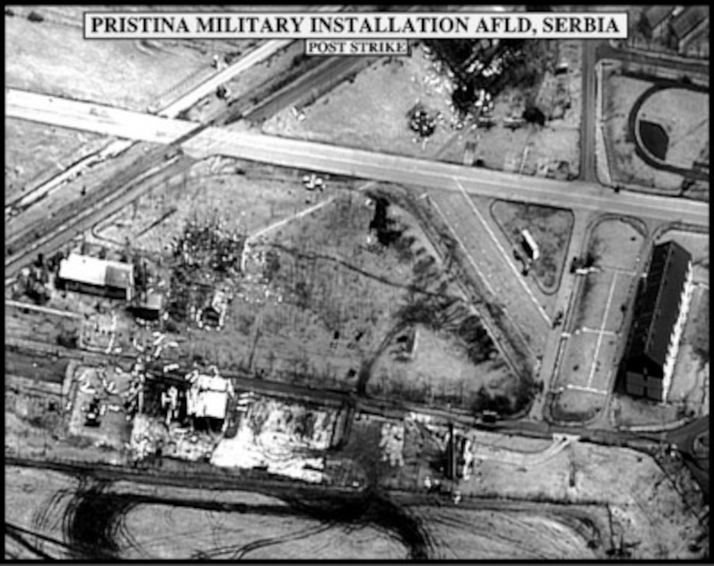 Post-strike bomb damage assessment photograph of the Pristina Military Installation Airfield, Serbia, used by Joint Staff Vice Director for Strategic Plans and Policy Maj. Gen. Charles F. Wald, U.S. Air Force, during a press briefing on NATO Operation Allied Force in the Pentagon on April 22, 1999. 