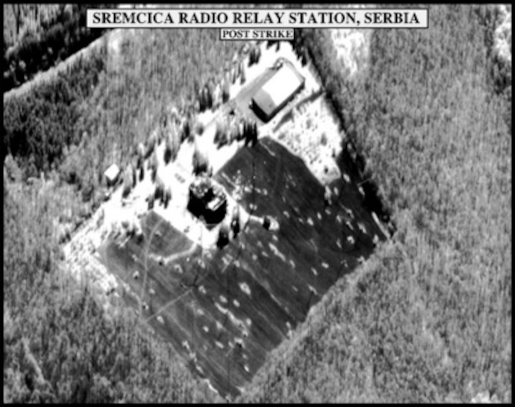 Post-strike bomb damage assessment photograph of the Sremcica Radio Relay Station, Serbia, used by Joint Staff Vice Director for Strategic Plans and Policy Maj. Gen. Charles F. Wald, U.S. Air Force, during a press briefing on NATO Operation Allied Force in the Pentagon on April 26, 1999. 