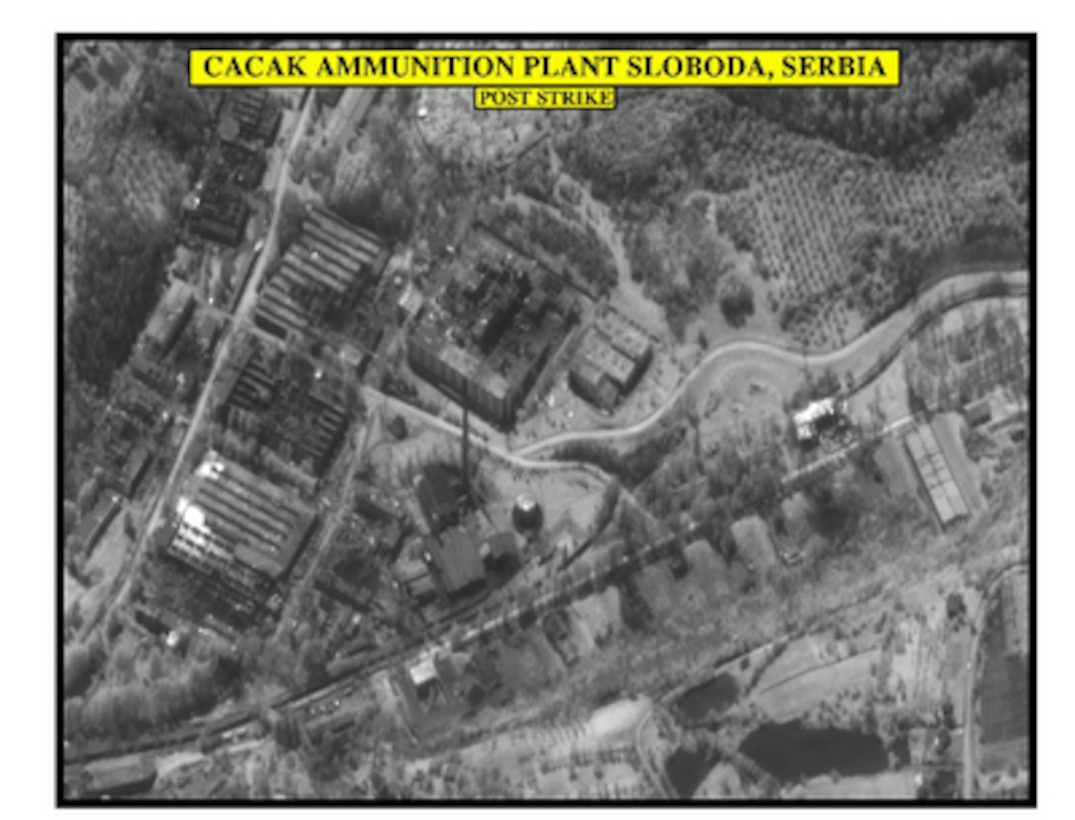 Post-strike bomb damage assessment photograph of the Cacak ammunition plant Sloboda, Serbia, used by Joint Staff Vice Director for Strategic Plans and Policy Maj. Gen. Charles F. Wald, U.S. Air Force, during a press briefing on NATO Operation Allied Force in the Pentagon on April 28, 1999. 