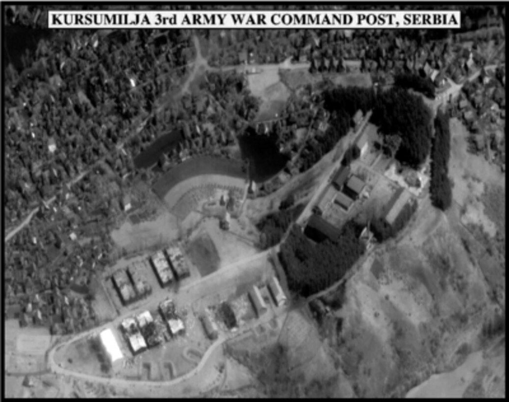 Post-strike bomb damage assessment photograph of the Kursumilja 3rd Army War Command Post, Serbia, used by Joint Staff Director of Intelligence Rear Adm. Thomas R. Wilson, U.S. Navy, during a press briefing on NATO Operation Allied Force in the Pentagon on April 30, 1999. 