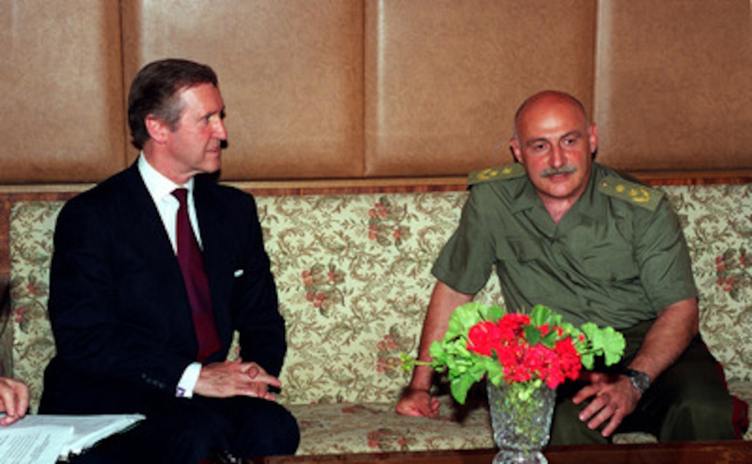Secretary of Defense William S. Cohen (left) talks with Minister of Defense David Tevzadze (right) prior to his departure from Tbilisi, Georgia, on Aug. 1, 1999. The leaders discussed fundamental work on developing modern defense strategy and methodology for reforming the Georgian armed forces. 