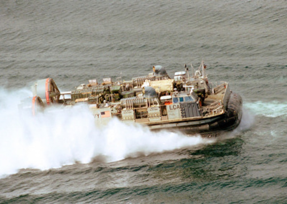 A U.S. Navy Landing Craft Air Cushion, more commonly called an LCAC, carries vehicles and supplies for use by Marines and sailors ashore at Hersek, Turkey, on Aug. 29, 1999. The Kearsarge Amphibious Readiness Group and the 26th Marine Expeditionary Unit are in Turkey to aid victims of the recent earthquake as part of Operation Avid Response. Avid Response is the U.S. military contribution to relief efforts following the earthquake that hit Western Turkey in the early morning hours of Aug. 17, 1999. The vehicles will assist the Turkish government in moving earthquake relief supplies. 