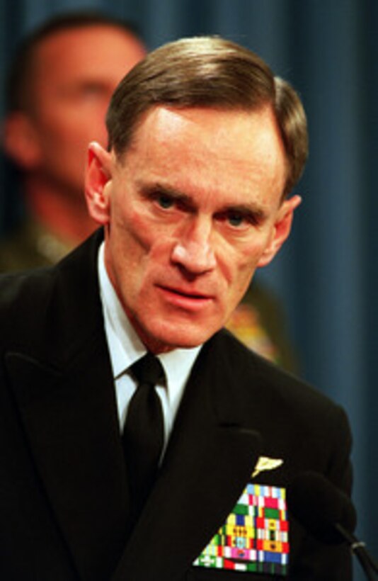 Chief of Naval Operations Adm. Jay Johnson responds to a reporter's question during a Pentagon briefing concerning the use of the training range on Vieques, Puerto Rico, on Dec. 3, 1999. 