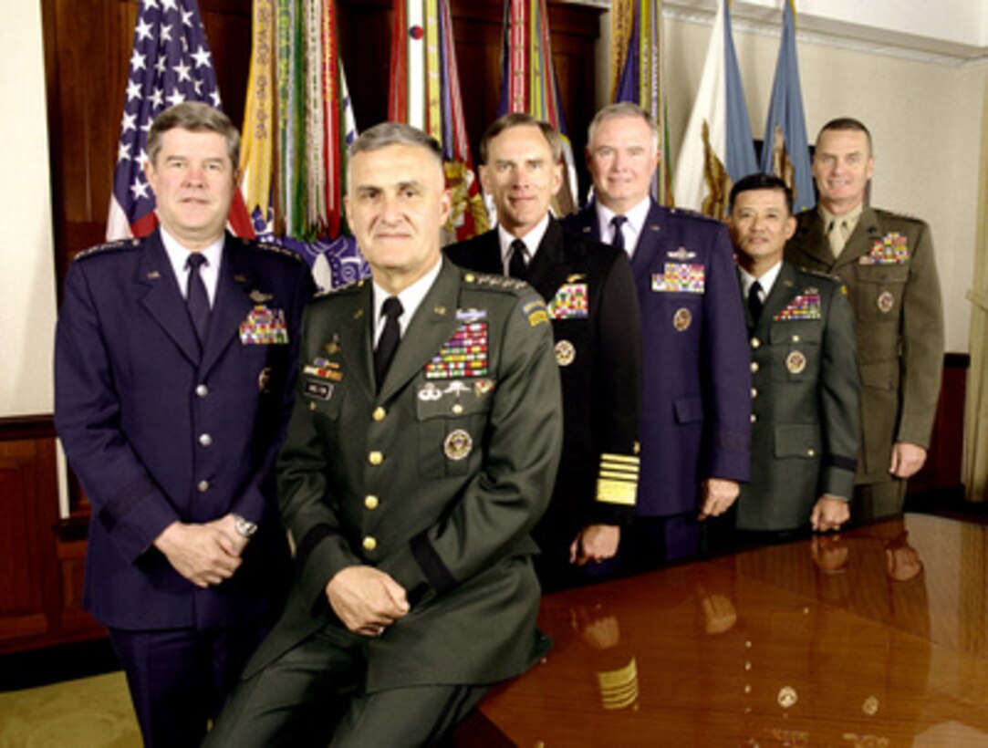 The Joint Chiefs of Staff photographed in the Joint Chiefs of Staff Gold Room, more commonly known as The Tank, in the Pentagon on July 27, 1999. From left to right are: Vice Chairman of the Joint Chiefs of Staff Gen. Joseph W. Ralston, U.S. Air Force, Chairman of the Joint Chiefs of Staff Gen. Henry H. Shelton, U.S. Army, U.S. Navy Chief of Naval Operations Adm. Jay L. Johnson, U.S. Air Force Chief of Staff Gen. Michael E. Ryan, U.S. Army Chief of Staff Gen. Eric K. Shinseki and U.S. Marine Corps Commandant Gen. James L. Jones Jr. 