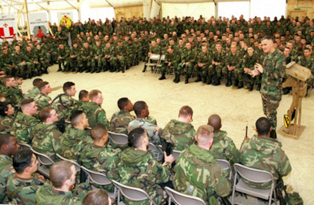 Gen. Henry H. Shelton, chairman of the Joint Chiefs of Staff, thanks the soldiers gathered at the Eagle Sports Complex in Tuzla, Bosnia and Herzegovina, on Dec. 22, 1998, for their dedication and service to the nation. Shelton spoke to the soldiers about their mission, education and the proposed pay raise for military personnel. The soldiers are deployed to Bosnia and Herzegovina in support of Operation Joint Forge. 