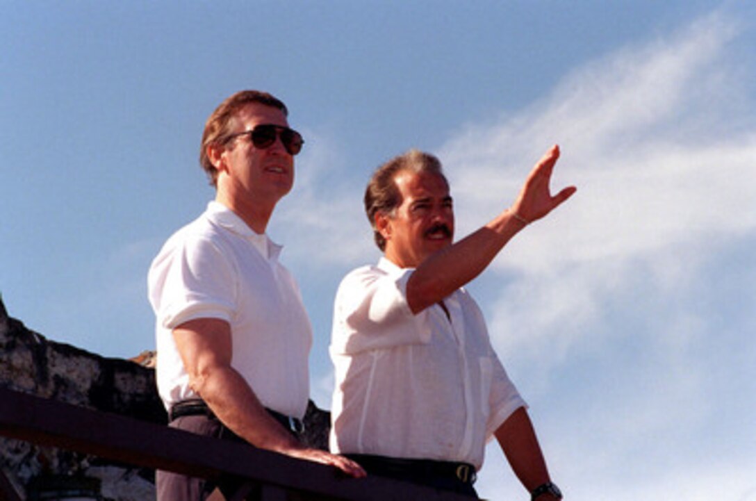 President Andres Pastrana (right) points to the sights in Cartagena, Colombia, for visiting Secretary of Defense William S. Cohen (left), on Nov. 30, 1998. Cohen is in the Caribbean city attending the Third Defense Ministerial of the Americas. 