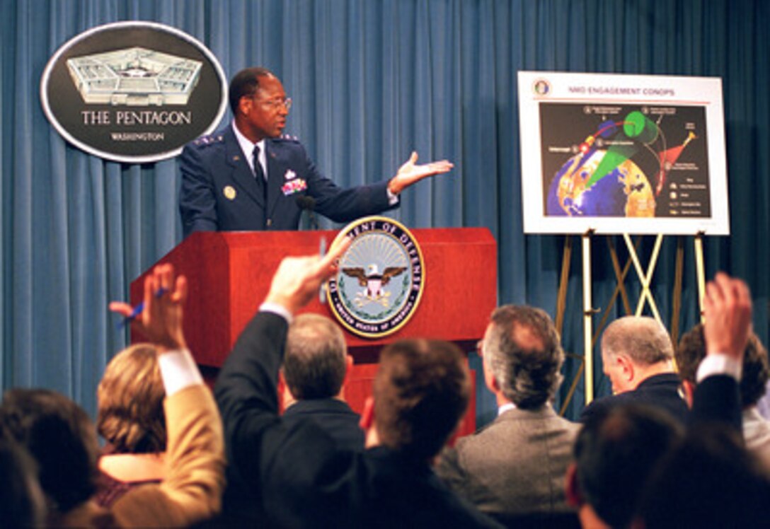 Air Force Lt. Gen. Lester L. Lyles, director of the Ballistic Missile Defense Organization, briefs reporters at the Pentagon, Jan. 20, 1999, on the latest developments in hardware, operational concepts, and political/diplomatic considerations relating to defense against missiles. 