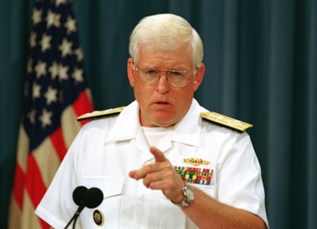 Adm. Richard W. Mies, U.S. Navy, commander in chief, U.S. Strategic Command, briefs reporters at the Pentagon on July 22, 1999, on the current status of Department of Defense Nuclear Systems with regard to their being Y2K compliant. Mies said that all of the 486 nuclear systems, which includes both mission-critical and non-mission-critical systems, will be tested and brought into compliance by the end of the year. Currently, all but nine non-mission-critical systems have been brought into compliance. 