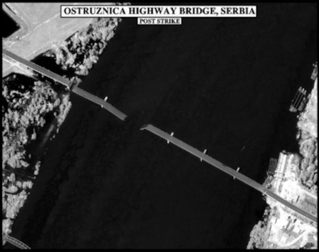 Post-strike bomb damage assessment photograph of the Ostruznica Highway Bridge, Serbia, used by Joint Staff Vice Director for Strategic Plans and Policy Maj. Gen. Charles F. Wald, U.S. Air Force, during a press briefing on NATO Operation Allied Force in the Pentagon on June 1, 1999. 