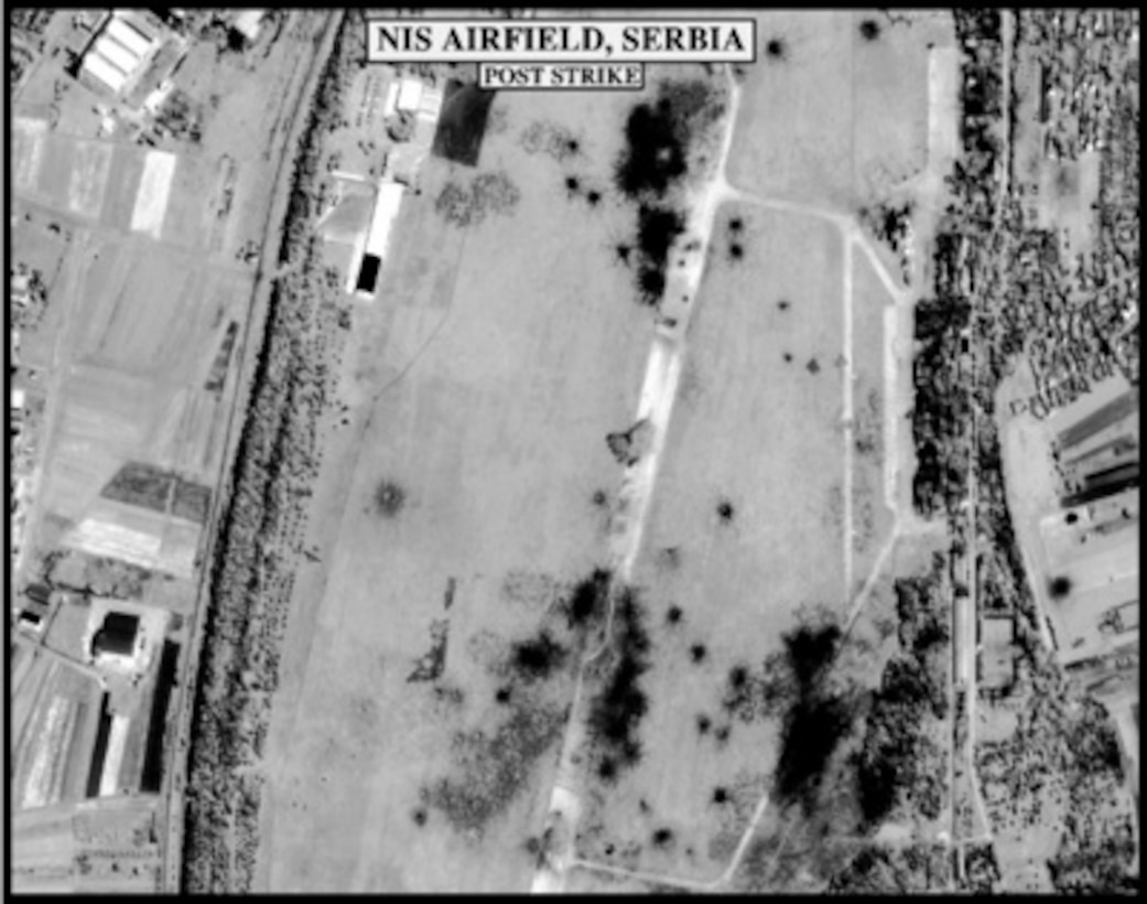 Post-strike bomb damage assessment photograph of the Nis Airfield, Serbia, used by Joint Staff Vice Director for Strategic Plans and Policy Maj. Gen. Charles F. Wald, U.S. Air Force, during a press briefing on NATO Operation Allied Force in the Pentagon on June 2, 1999. 