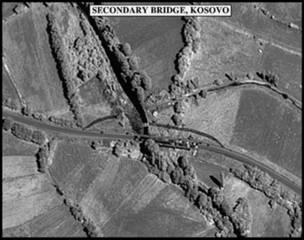 Assessment photograph of a Secondary Bridge, Kosovo, used by Joint Staff Vice Director for Strategic Plans and Policy Maj. Gen. Charles F. Wald, U.S. Air Force, during a press briefing on NATO Operation Allied Force in the Pentagon on June 2, 1999. 