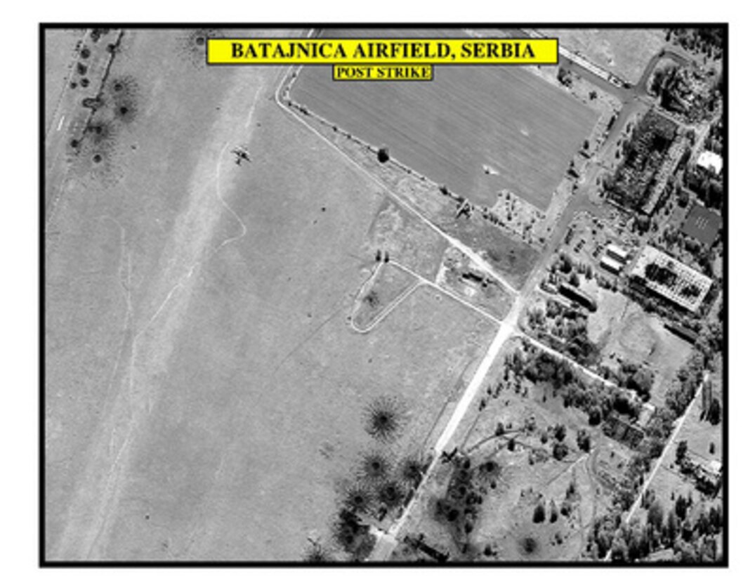 Post-strike bomb damage assessment photograph of Batajnica Airfield, Serbia, used by Joint Staff Vice Director for Strategic Plans and Policy Maj. Gen. Charles F. Wald, U.S. Air Force, during a press briefing on NATO Operation Allied Force in the Pentagon on June 9, 1999. 