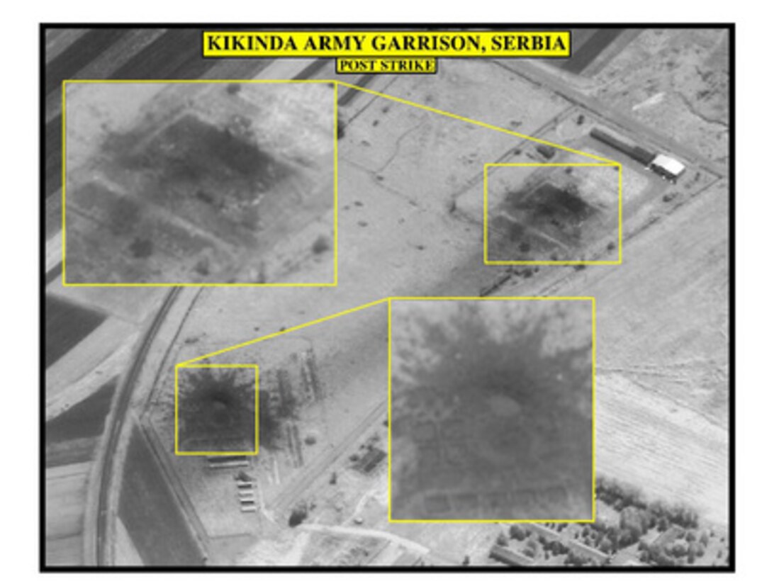 Post-strike bomb damage assessment photograph of the Kikinda Army Garrison, Serbia, used by Joint Staff Vice Director for Strategic Plans and Policy Maj. Gen. Charles F. Wald, U.S. Air Force, during a press briefing on NATO Operation Allied Force in the Pentagon on June 9, 1999. 