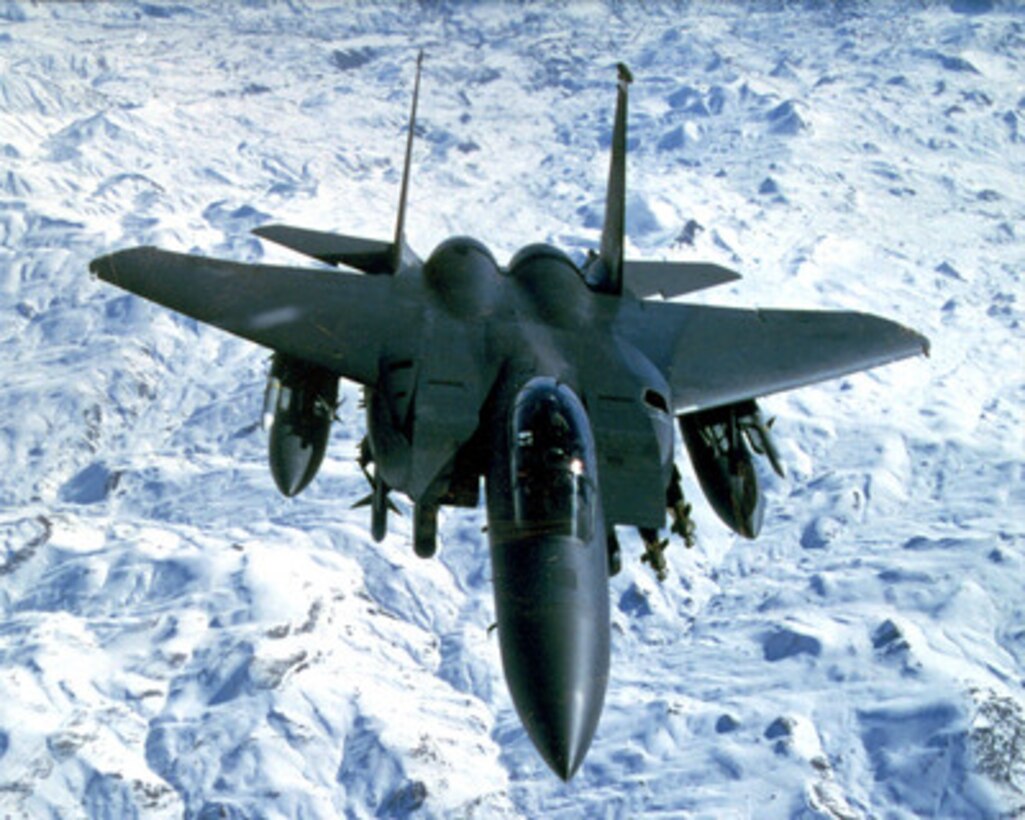 A U.S. Air Force F-15E Eagle flies above snow covered mountains during a routine patrol over Northern Iraq on Feb. 18, 1999, in support of Operation Northern Watch. Northern Watch is the coalition enforcement of the no-fly-zone over Northern Iraq. The Eagle is deployed from the 494th Expeditionary Fighter Squadron, RAF Lakenheath, United Kingdom. 