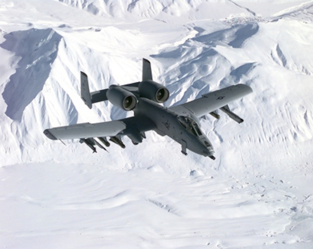 A 355th Fighter Squadron A/OA-10 Thunderbolt II moves in position under and slightly behind a KC-135R Stratotanker to commence refueling operations during Exercise Northern Edge '99 on March 9, 1999. The Thunderbolt, affectionately known as a Warthog, is from Eielson Air Force Base, Alaska. The Stratotanker is attached to the 168th Air Refueling Squadron, Alaska Air National Guard. 