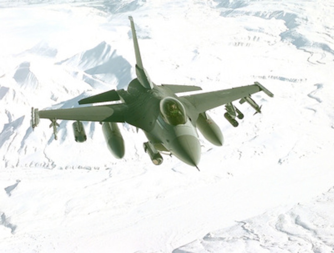 An F-16 Fighting Falcon approaches a KC-135R Stratotanker for refueling during Exercise Northern Edge '99 on March 9, 1999. The Fighting Falcon is assigned to the 18th Fighter Squadron, Eielson Air Force Base, Alaska. The Stratotanker is attached to the 168th Air Refueling Squadron, Alaska Air National Guard. 