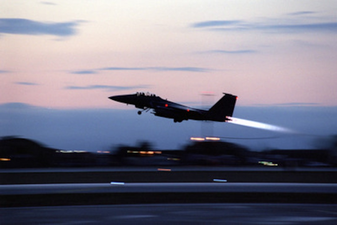 A U.S. Air Force F-15E Strike Eagle takes off from Aviano Air Base, Italy, for an air strike mission in support of NATO Operation Allied Force on March 28, 1999. Operation Allied Force is the air operation against targets in the Federal Republic of Yugoslavia. 